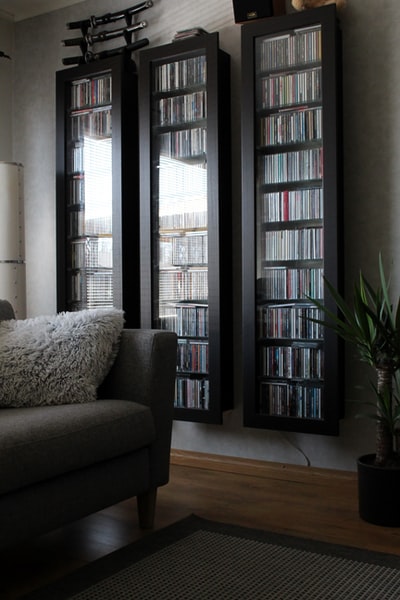 Gray sofa chair by the window
